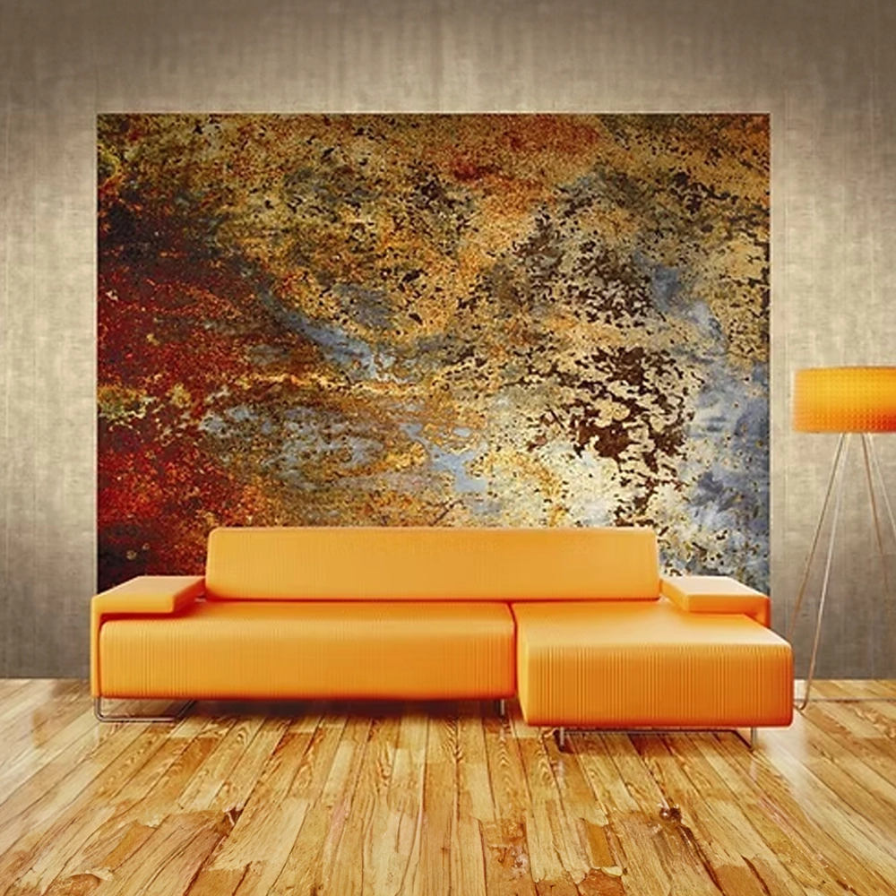 Contemporary orange sofa displayed beneath abstract artwork in a modern interior.